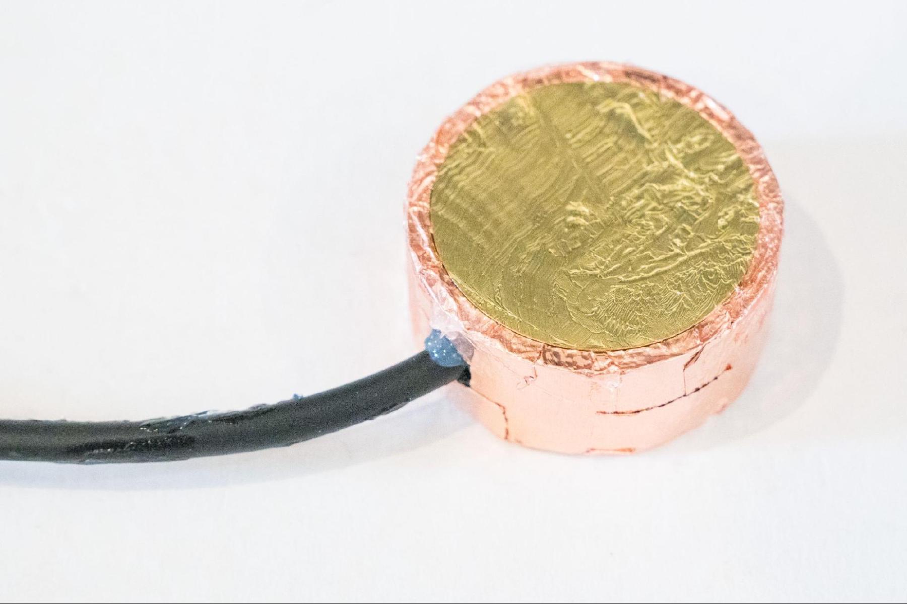 Piezo disc pressed into silicone