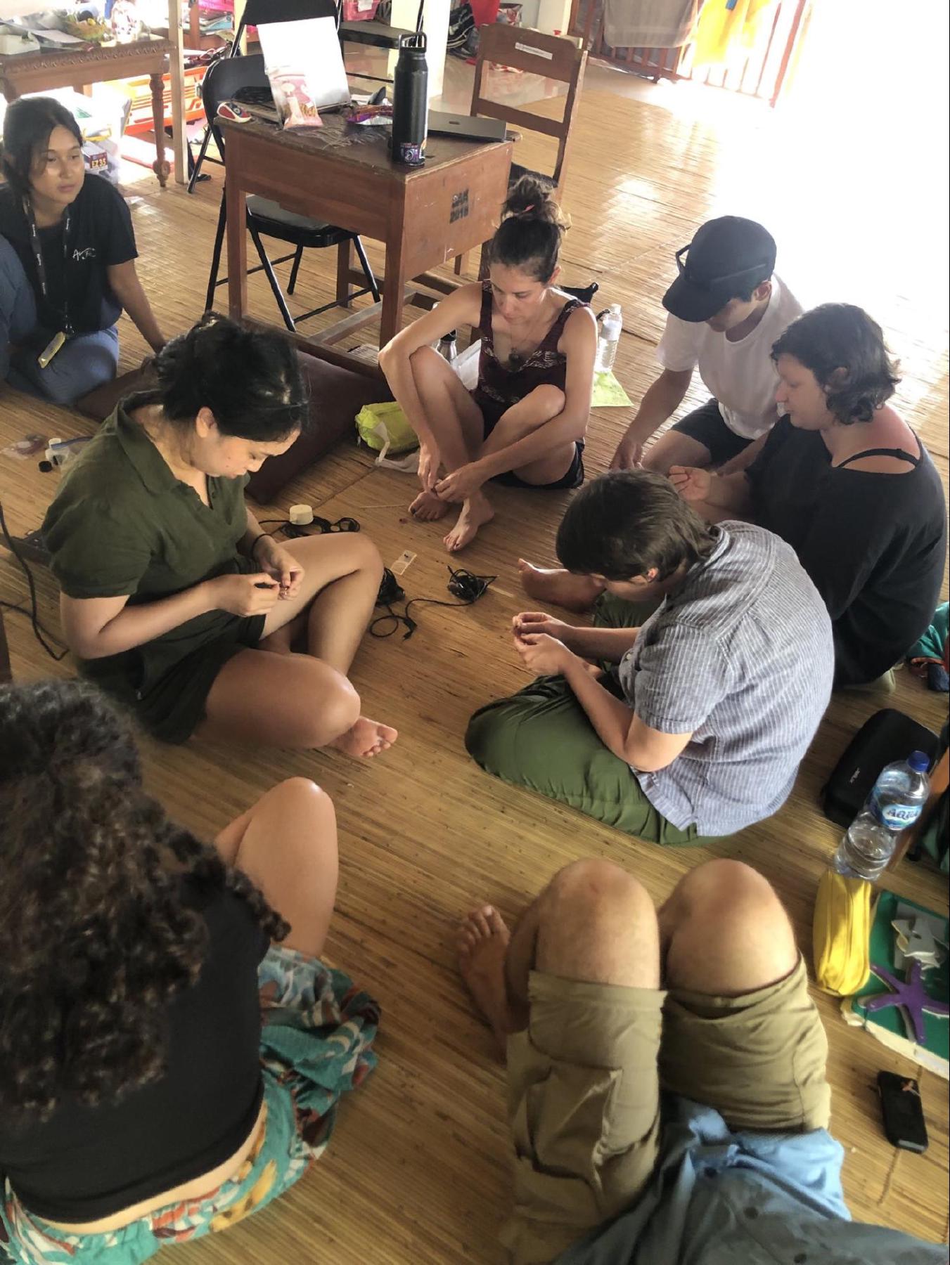 Participants assembling electronic components